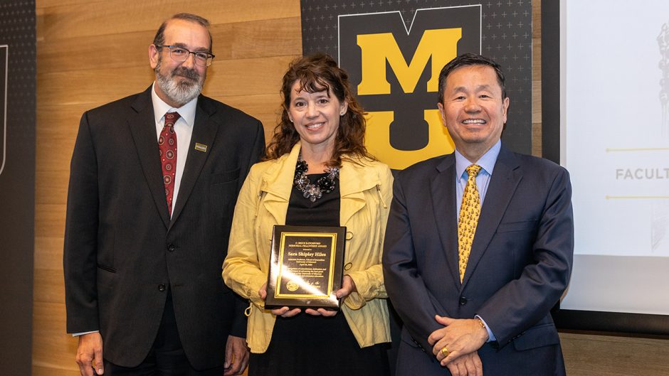 shipley hiles with president choi and another man