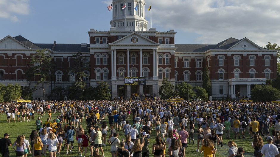 Students go through the columns during Tiger Walk Aug. 20, 2023.