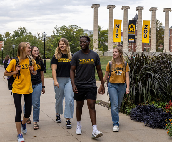 group of students walking by the columns at the University of Missouri