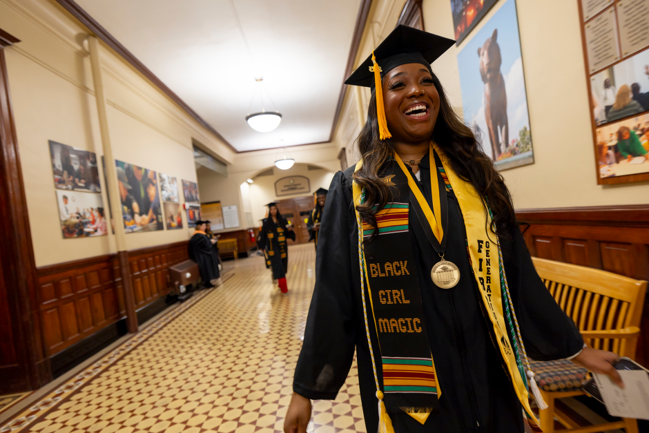 a graduate walking through the halls of jesse ecstatic