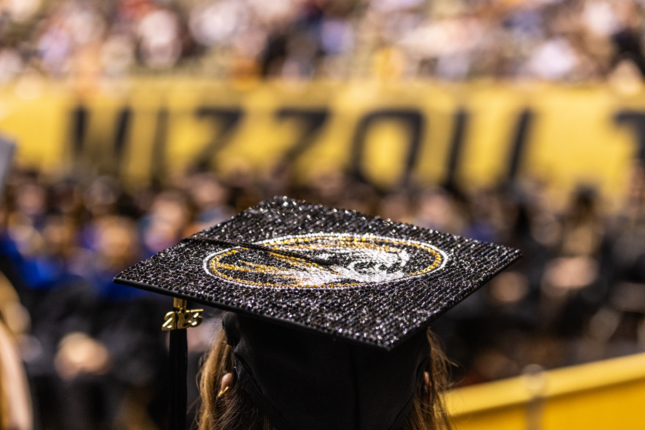 a graduate cap bedazzled with the mizzou logo