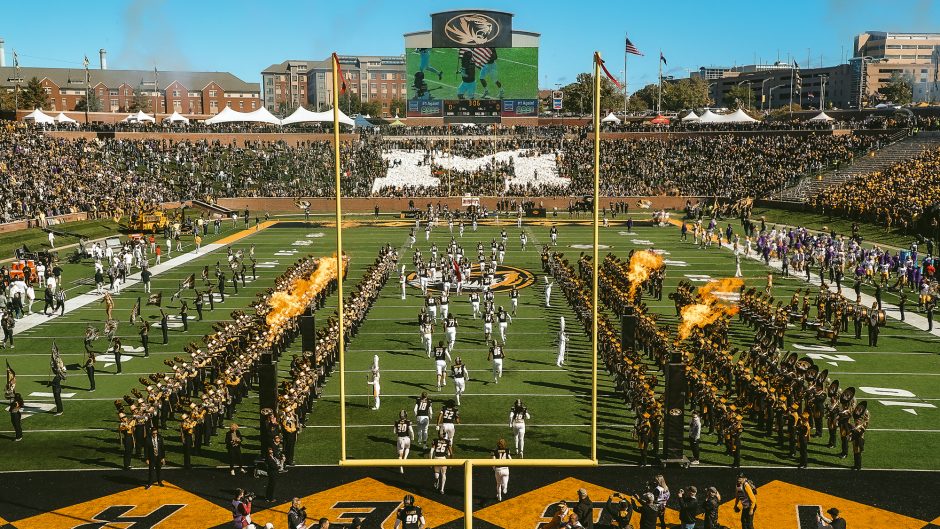 mizzou football field with players and fans