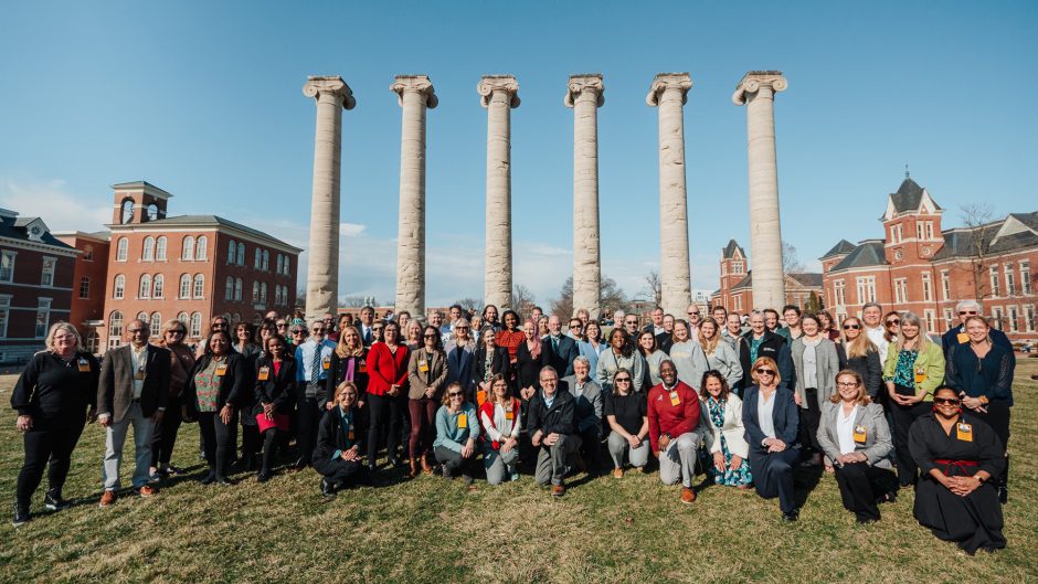 group photo in front of the columns
