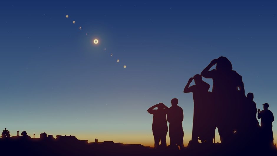 People looking at different phases of a solar eclipse.