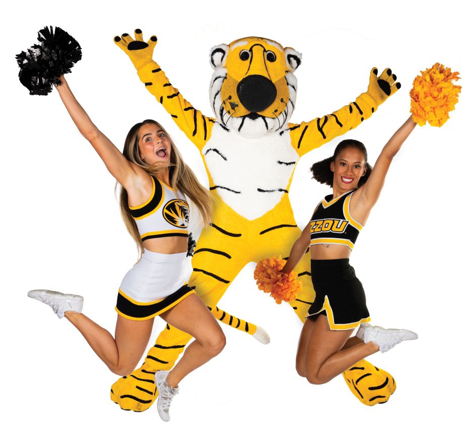 Truman mascot jumping with cheerleaders
