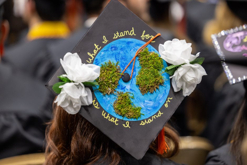 Mortar board decorated with Earth, flowers
