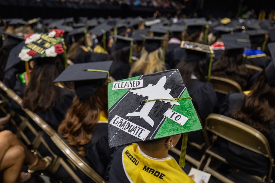 Mortar board decorated with plane