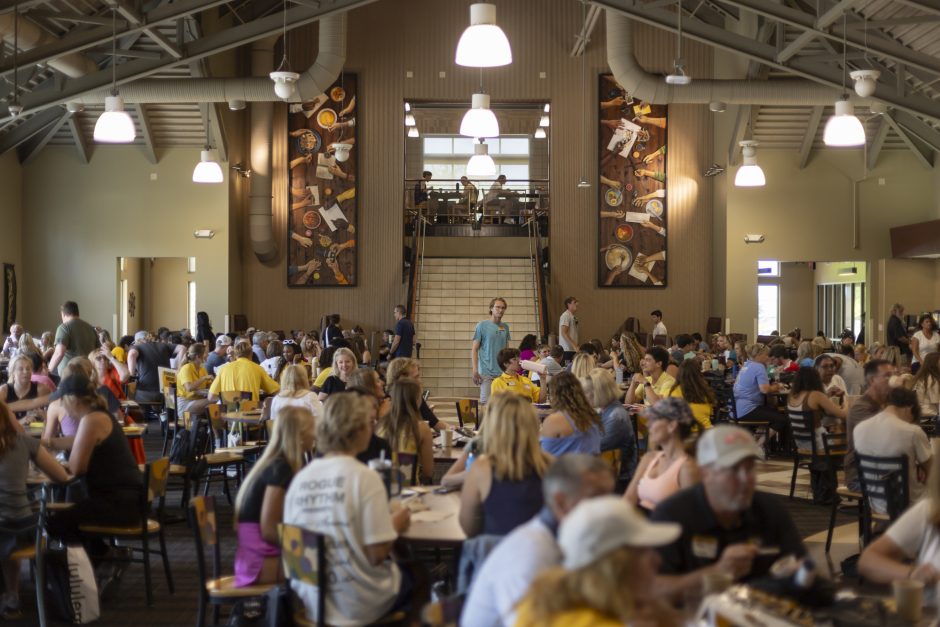 Families share a meal during Summer Welcome