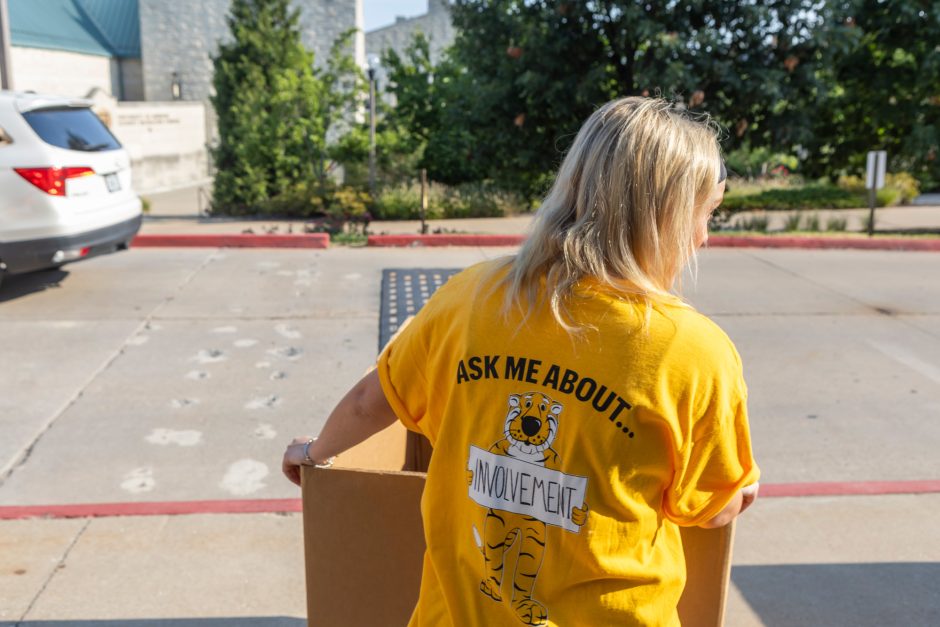 Volunteer wearing involvement shirt