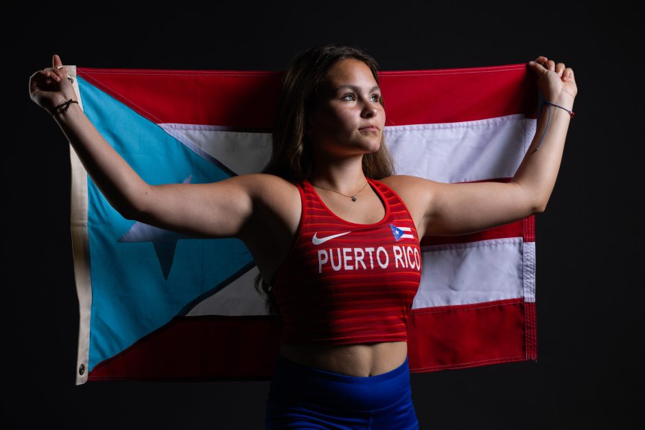 Amaris Vanquez Collazo with Puerto Rico flag