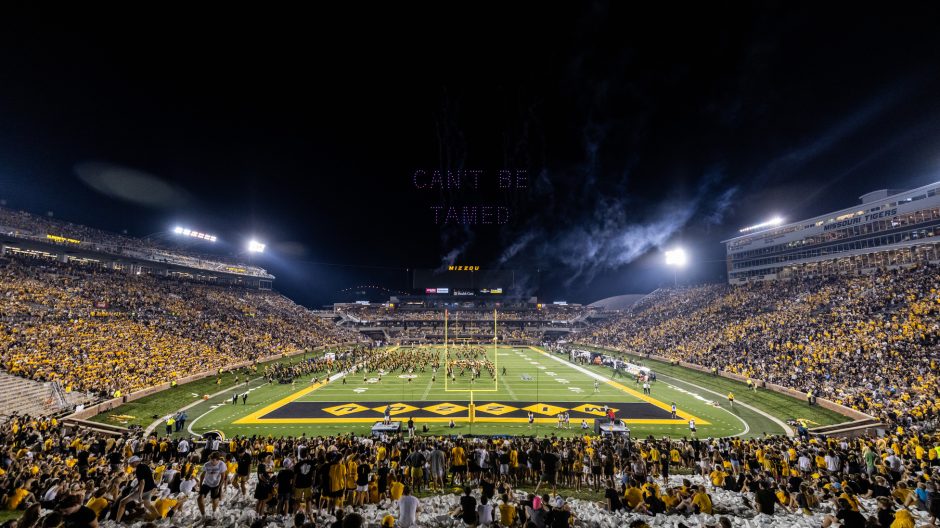 drone show at a football game. drones spell 