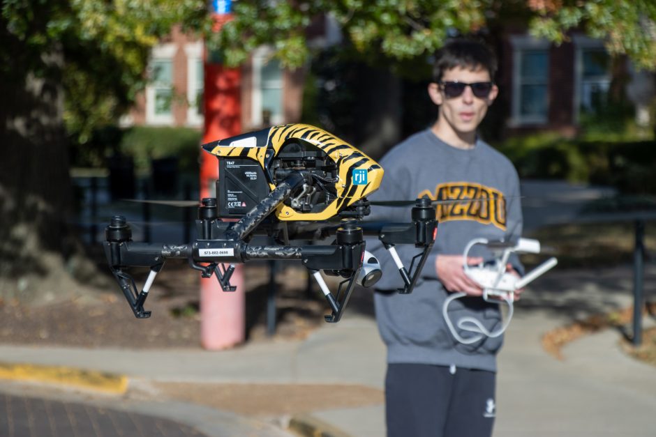 Student flies drone as part of journalism class