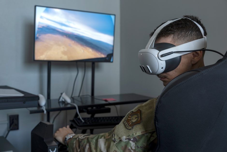 Student in VR goggles uses the flight simulator