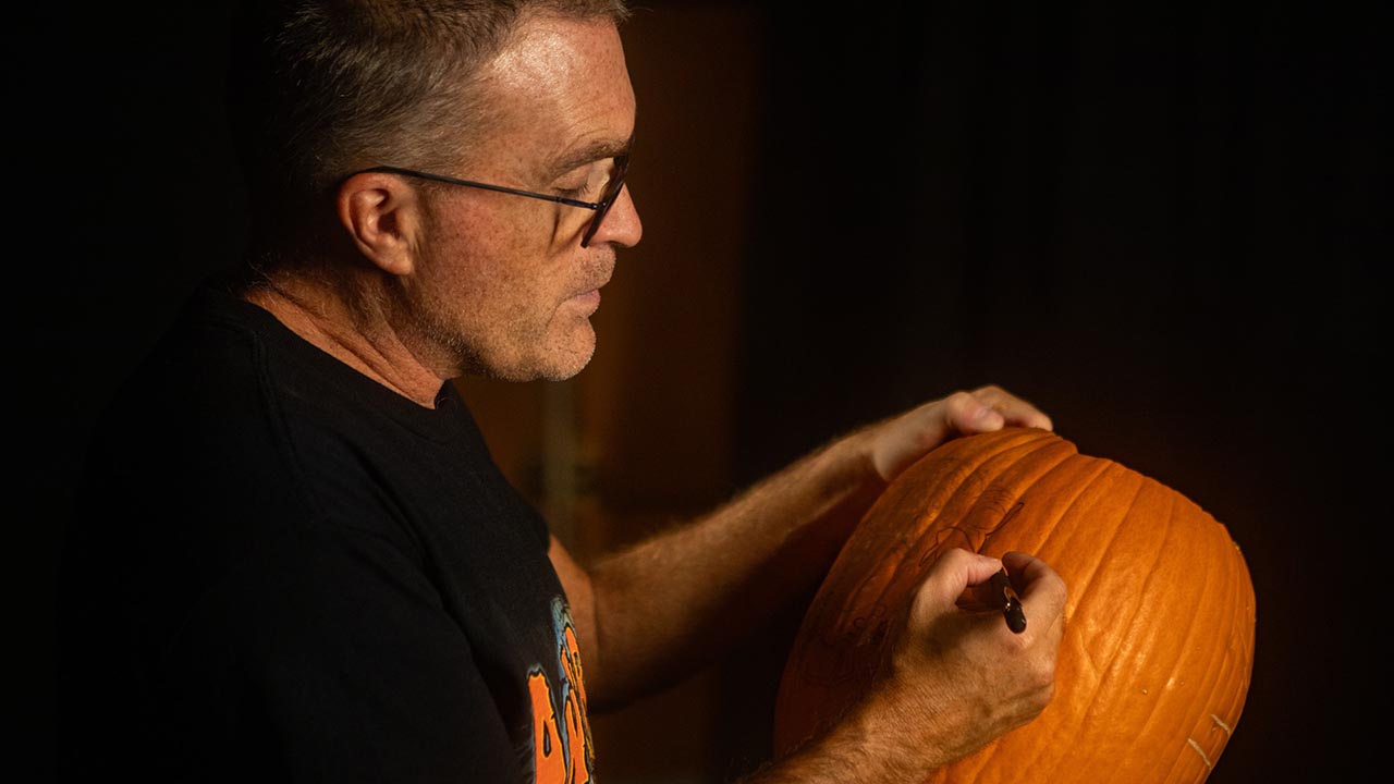 Mannie Liscum with pumpkin