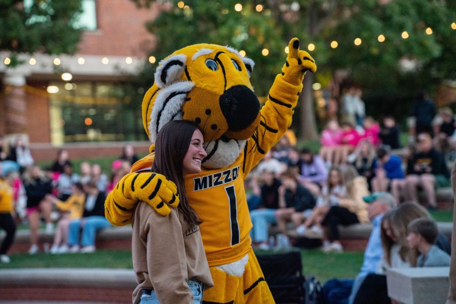 Truman mascot with student