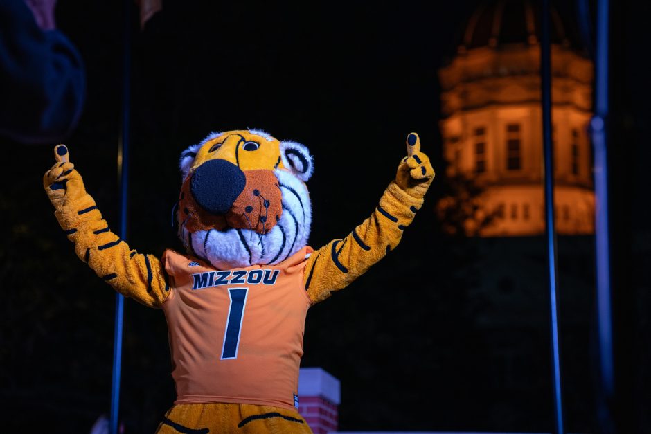 Truman mascot in front of gold dome