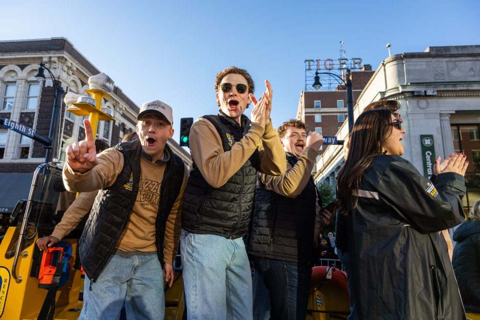 Students cheer at parade