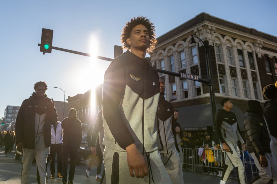 Students walk in parade