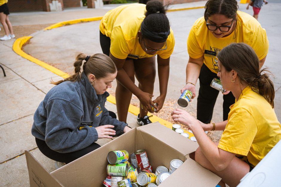 Students sort canned food