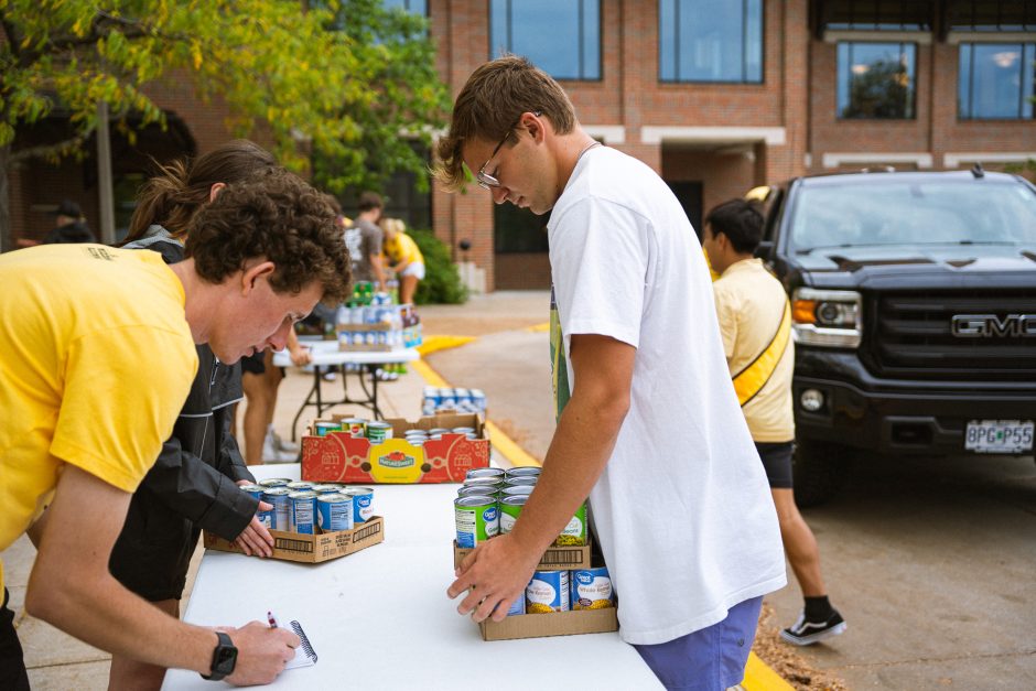 Students sort canned food