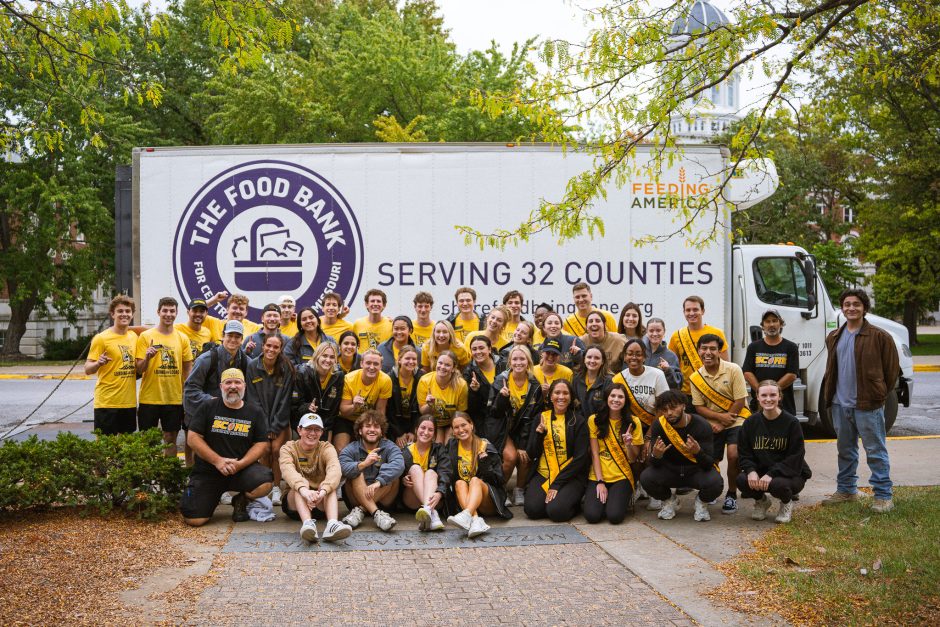 Group of students in front of food bank truck