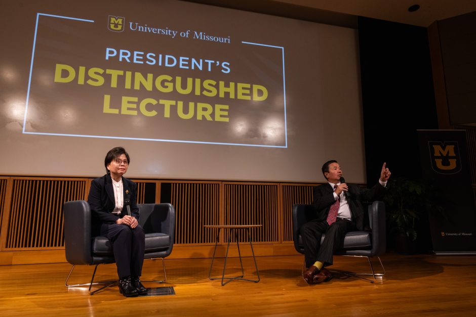 Harriet Kung and Mun Choi, seated, take questions from the audience