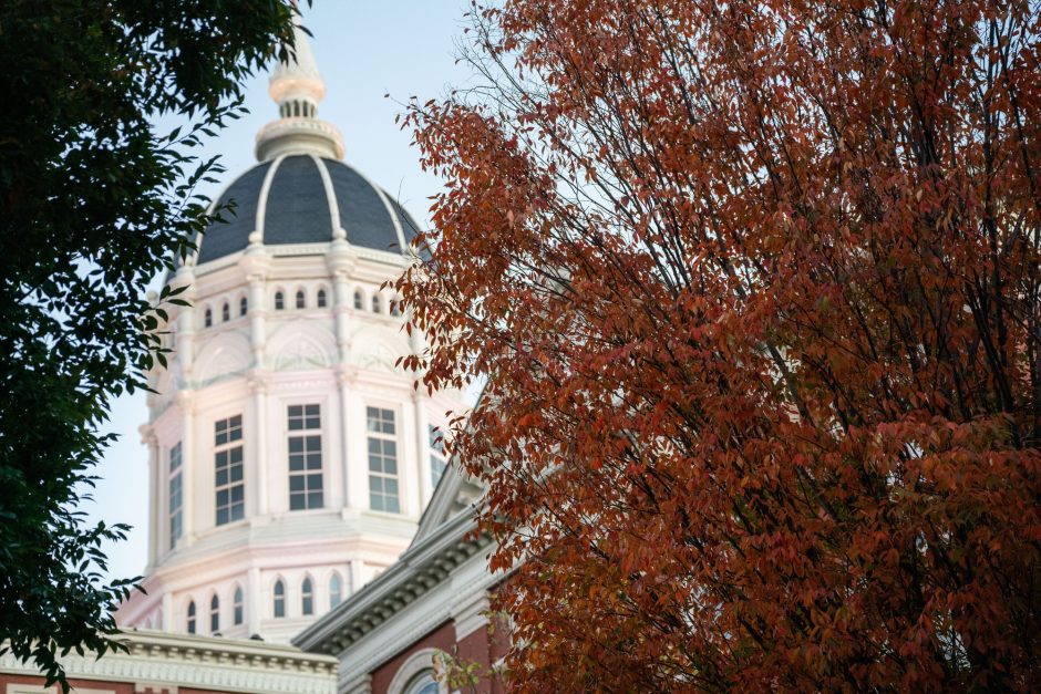 Red leaves frame the Jesse Hall Dome