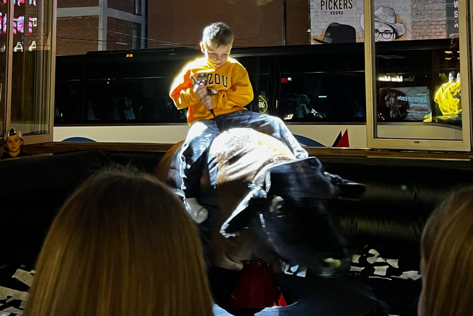 Boy on bull statue