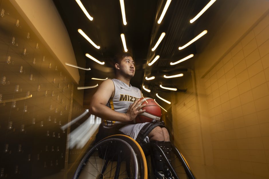 Person in wheelchair with basketball