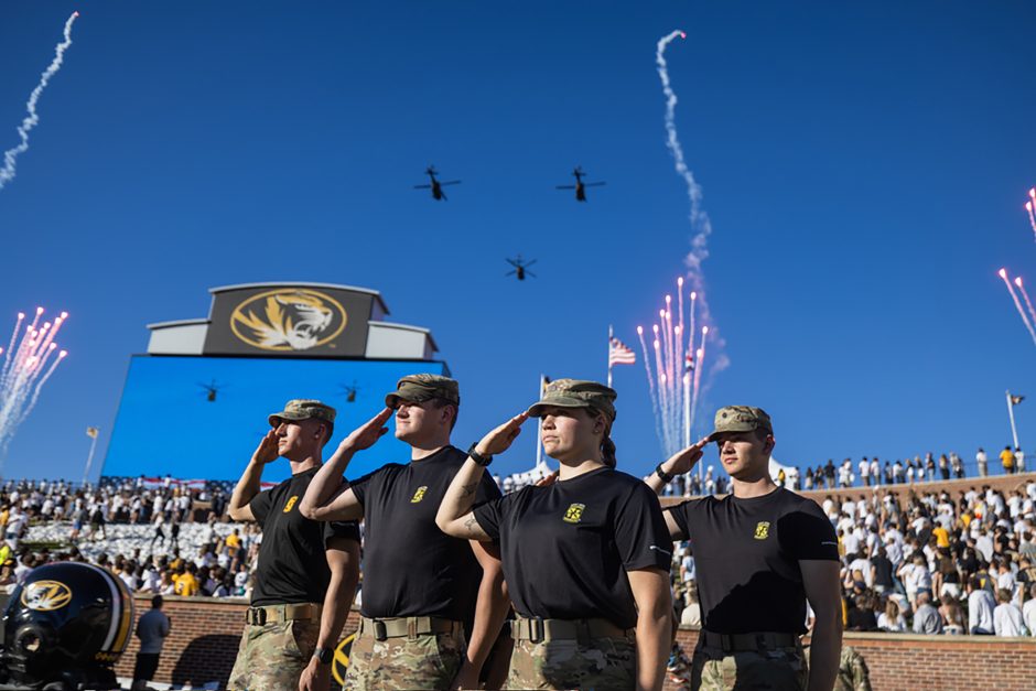 ROTC cadets salute during football game