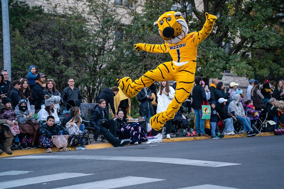 Truman mascot jumps during parade