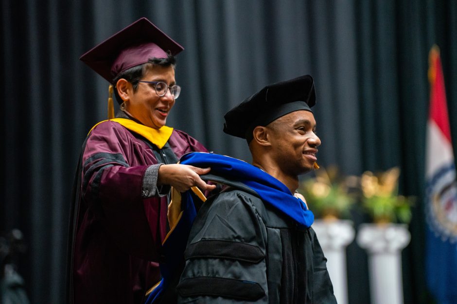 Graduate gets hooded