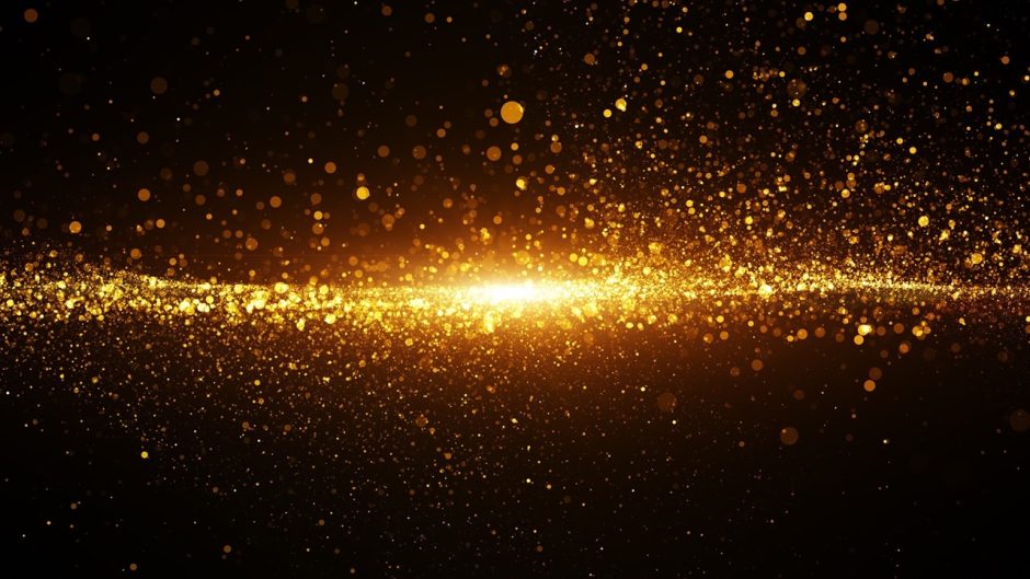 Gold color digital particles wave flow and light flare. Abstract technology background.