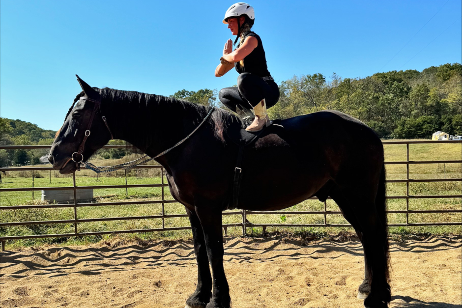 Lischwe practicing yoga from on top of Eclipse.