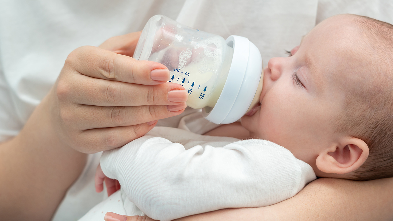 A baby drinking milk.