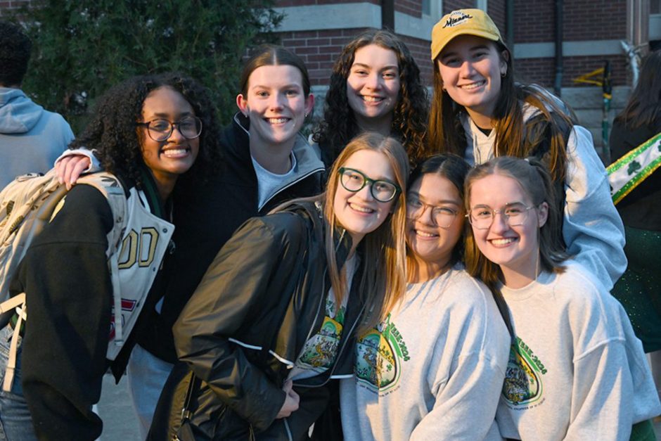 Group of students in engineering shirts smiling