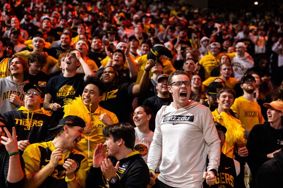 Crowd at basketball game cheering