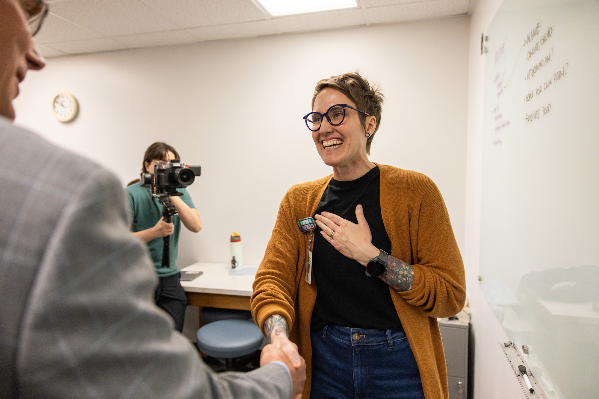 Tamara Hancock shakes hands with Provost Martens