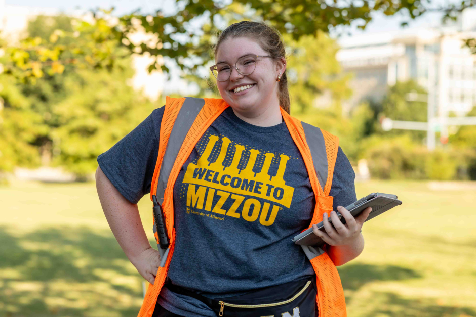 Student in orange vest