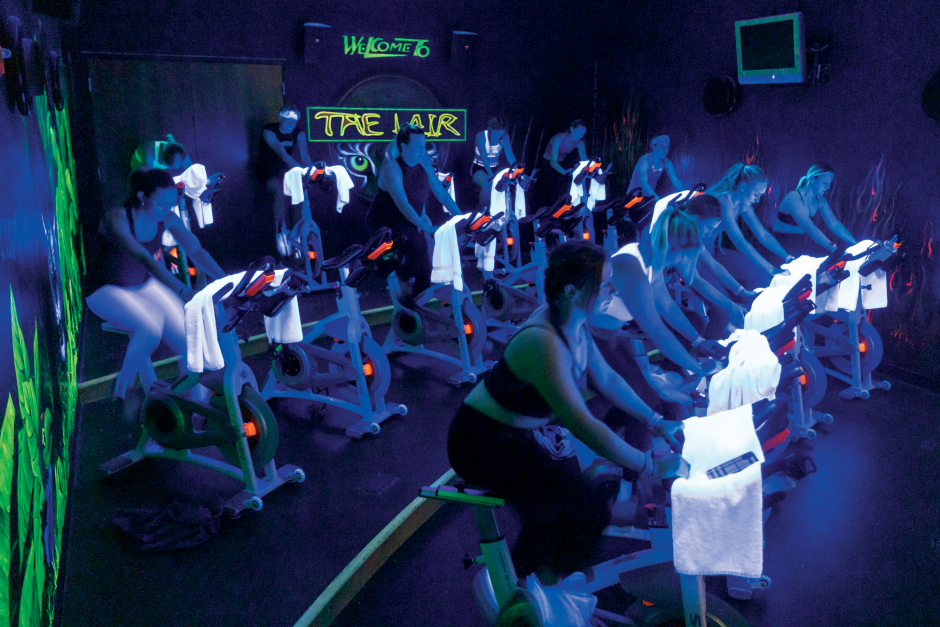 People on exercise bikes