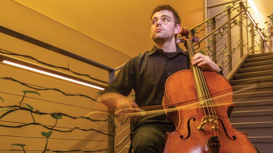 Dean Wibe playing cello