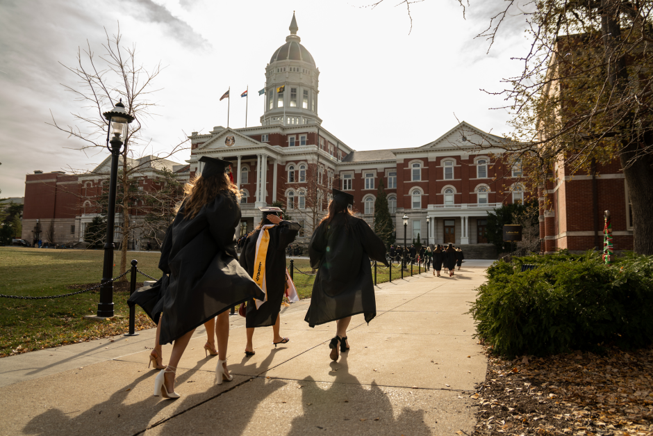 Graduates rush toward building