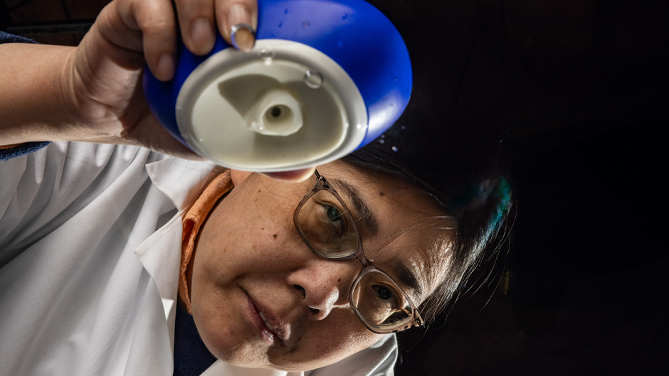 Hongmin Sun posing with her new device.