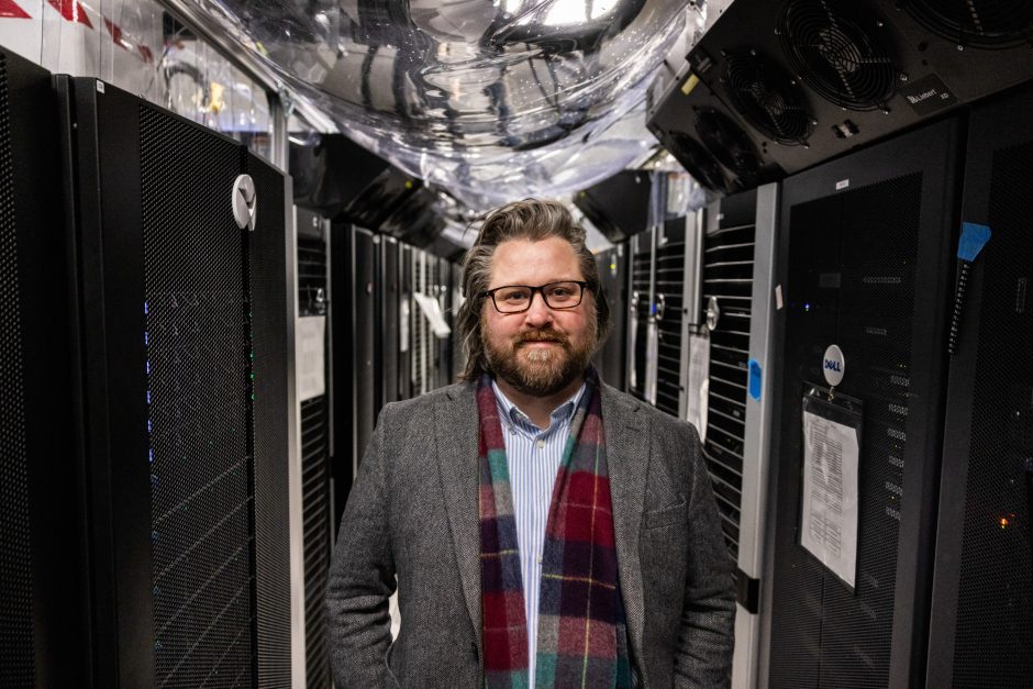 Researcher wearing a blazer and scarf