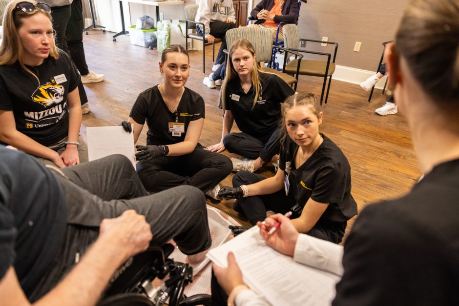 Students working with patients