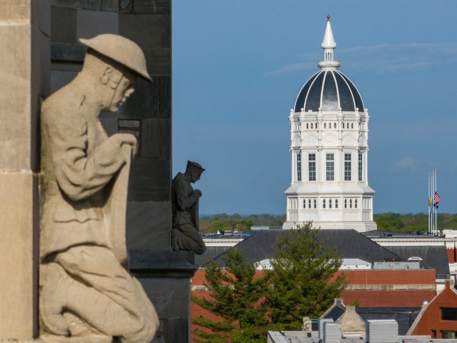 Jesse Hall appearing beyond statues on Memorial Union