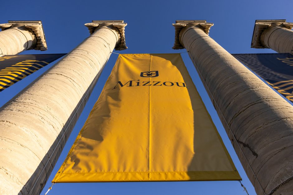 Banner hanging between two of the Columns