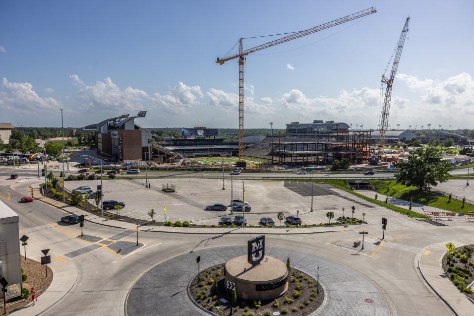 Cranes and stadium under construction