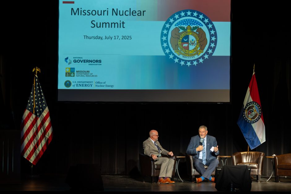 Two people seated on stage at the Missouri Nuclear Summit
