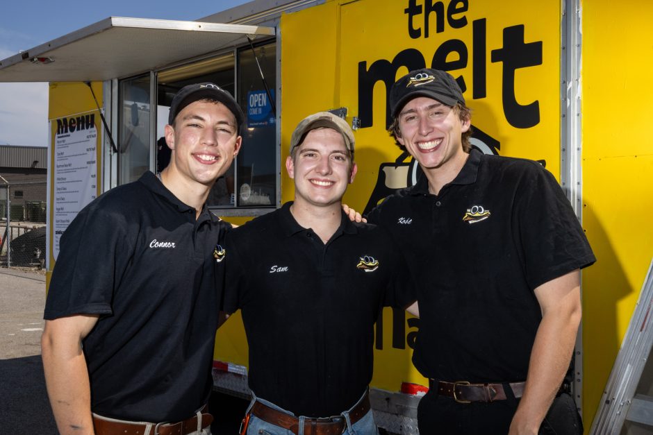 Three students in black shirts